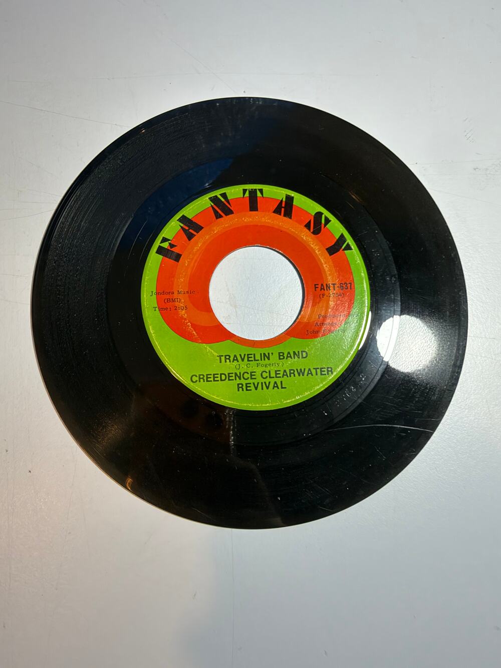 CREEDENCE CLEARWATER REVIVAL WHO'LL STOP THE RAIN / TRAVELIN BAND 45 RPM RECORD